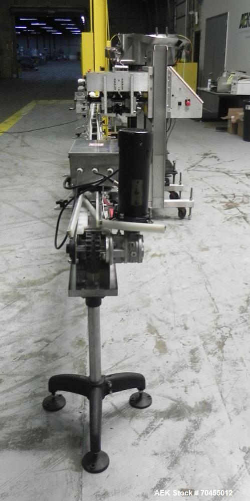 Used ELF Model CT400L Automatic Inline Quill Capper. Fully adjustable for a cap size range of 8mm - 110mm wide and a container size range of 1" - 14" tall. Has wormscrew timing infeed on a 255" x 4-1...