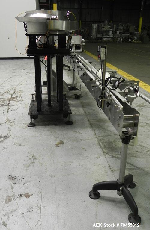 Used ELF Model CT400L Automatic Inline Quill Capper. Fully adjustable for a cap size range of 8mm - 110mm wide and a container size range of 1" - 14" tall. Has wormscrew timing infeed on a 255" x 4-1...