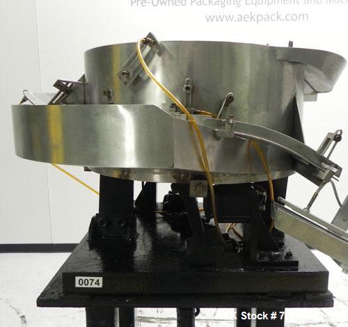 Used ELF Model CT400L Automatic Inline Quill Capper. Fully adjustable for a cap size range of 8mm - 110mm wide and a container size range of 1" - 14" tall. Has wormscrew timing infeed on a 255" x 4-1...