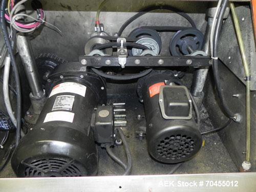 Used ELF Model CT400L Automatic Inline Quill Capper. Fully adjustable for a cap size range of 8mm - 110mm wide and a container size range of 1" - 14" tall. Has wormscrew timing infeed on a 255" x 4-1...