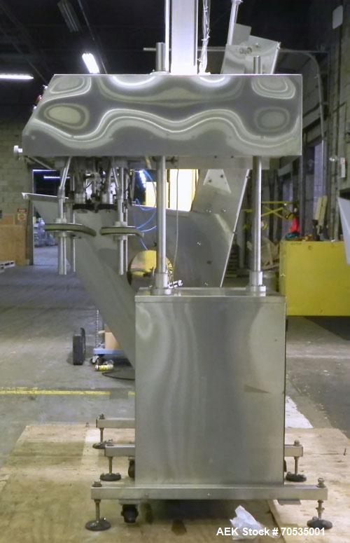 Used Inline Filling Systems Automatic Belt Capper. Machine is rated at up to 200 caps per minute depending on cap size and container configuration. Capper main unit can handle a cap size range up to ...
