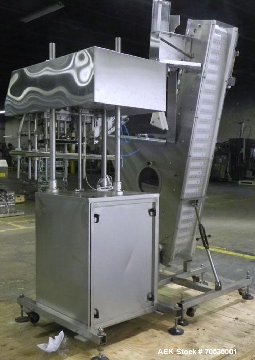 Used Inline Filling Systems Automatic Belt Capper. Machine is rated at up to 200 caps per minute depending on cap size and container configuration. Capper main unit can handle a cap size range up to ...