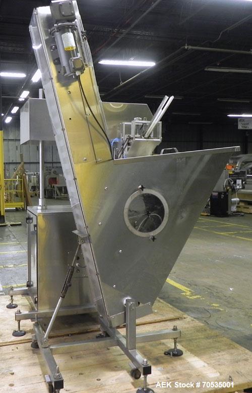 Used Inline Filling Systems Automatic Belt Capper. Machine is rated at up to 200 caps per minute depending on cap size and container configuration. Capper main unit can handle a cap size range up to ...