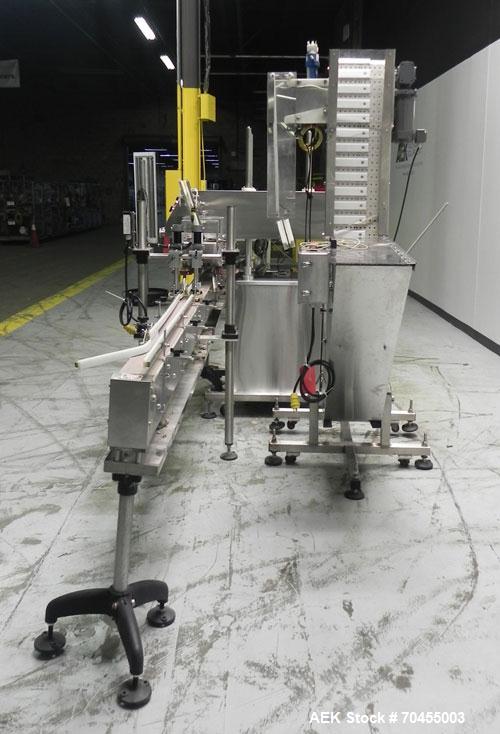 Used Inline Filling Systems inline belt capper with automatic cleated belt cap elevator. Capable of speeds up to 200 CPM (depending on cap size and container configuration). Has a container size rang...