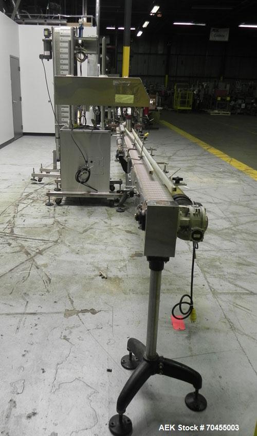 Used Inline Filling Systems inline belt capper with automatic cleated belt cap elevator. Capable of speeds up to 200 CPM (depending on cap size and container configuration). Has a container size rang...