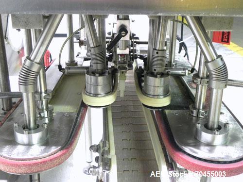 Used Inline Filling Systems inline belt capper with automatic cleated belt cap elevator. Capable of speeds up to 200 CPM (depending on cap size and container configuration). Has a container size rang...