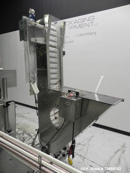 Used Inline Filling Systems inline belt capper with automatic cleated belt cap elevator. Capable of speeds up to 200 CPM (depending on cap size and container configuration). Has a container size rang...