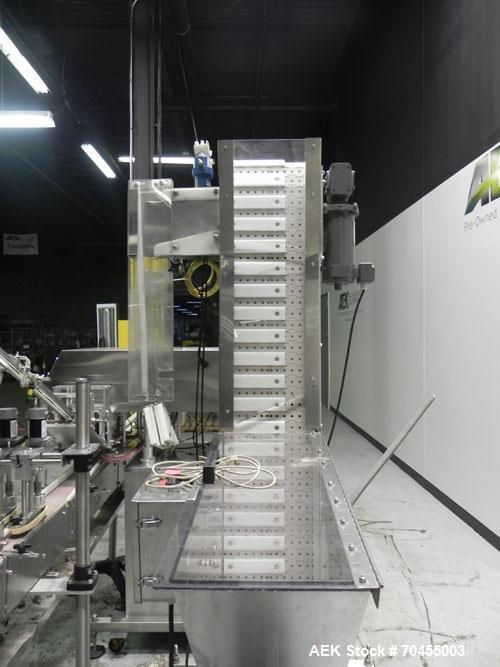 Used Inline Filling Systems inline belt capper with automatic cleated belt cap elevator. Capable of speeds up to 200 CPM (depending on cap size and container configuration). Has a container size rang...