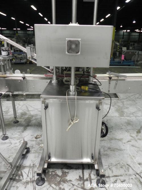 Used Inline Filling Systems inline belt capper with automatic cleated belt cap elevator. Capable of speeds up to 200 CPM (depending on cap size and container configuration). Has a container size rang...