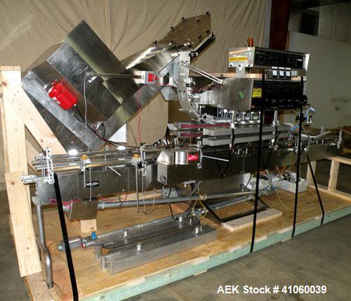 Used Kalish High Speed In Line Capper, 8 Quill, Model 5005, Stainless Steel. Last running 0 to 7-1/2" 946 ml bottles. Dual bottle feed belts. Includes a Kalish cap elevator, model 5650. Driven by a 1...