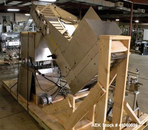 Used Kalish High Speed In Line Capper, 8 Quill, Model 5005, Stainless Steel. Last running 0 to 7-1/2" 946 ml bottles. Dual bottle feed belts. Includes a Kalish cap elevator, model 5650. Driven by a 1...