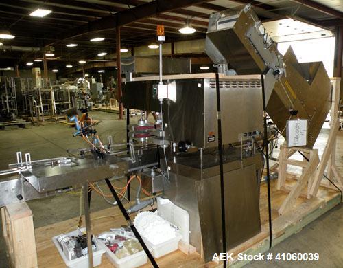 Used Kalish High Speed In Line Capper, 8 Quill, Model 5005, Stainless Steel. Last running 0 to 7-1/2" 946 ml bottles. Dual bottle feed belts. Includes a Kalish cap elevator, model 5650. Driven by a 1...