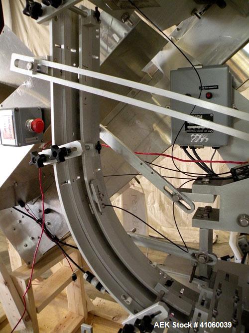 Used Kalish High Speed In Line Capper, 8 Quill, Model 5005, Stainless Steel. Last running 0 to 7-1/2" 946 ml bottles. Dual bottle feed belts. Includes a Kalish cap elevator, model 5650. Driven by a 1...