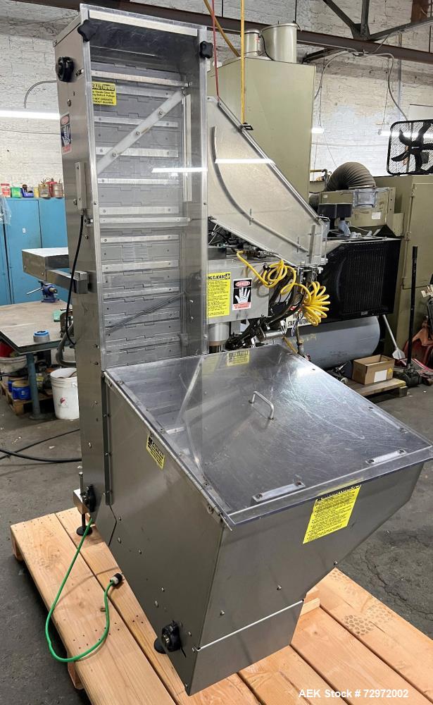 Used Kapsall Model A2 Inline Screw Capper. Capable of speeds up to 150 bottles per minute. Has single bottle grippers, three pair spindles  with adjustable cap chute and integrated cap elevator. Cap ...