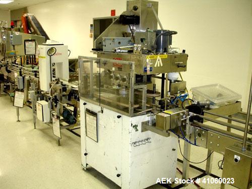 Used Kaps-All Capper, Model A. 6 quill with cap hopper, orienter and chute, serial #1802.