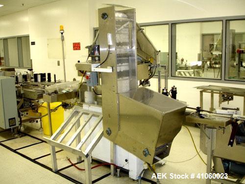 Used Kaps-All Capper, Model A. 6 quill with cap hopper, orienter and chute, serial #1802.