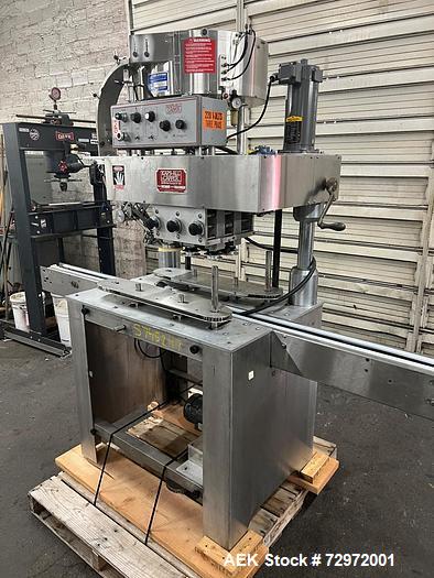 Used- Kapsall Model A Inline Screw Capper. Capable of speeds up to 200 bottles per minute. Has single bottle grippers, three...