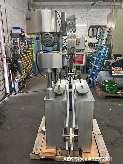 Used- Kapsall Model A Inline Screw Capper. Capable of speeds up to 200 bottles per minute. Has single bottle grippers, three...