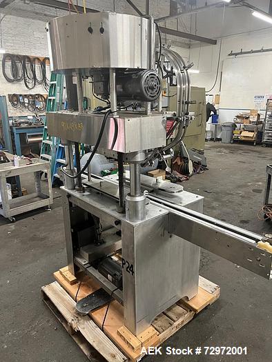 Used- Kapsall Model A Inline Screw Capper. Capable of speeds up to 200 bottles per minute. Has single bottle grippers, three...