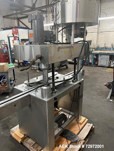 Used- Kapsall Model A Inline Screw Capper. Capable of speeds up to 200 bottles per minute. Has single bottle grippers, three...