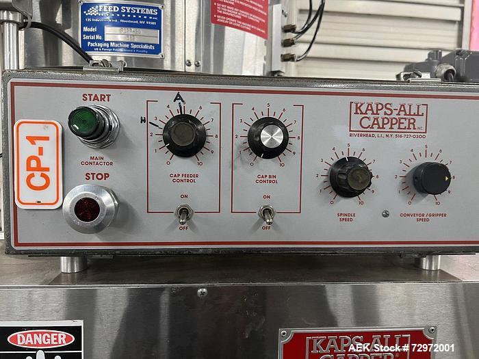 Used- Kapsall Model A Inline Screw Capper. Capable of speeds up to 200 bottles per minute. Has single bottle grippers, three...