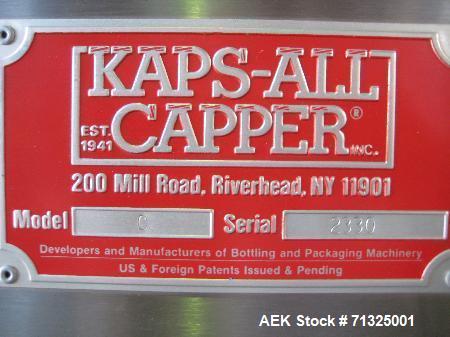 Used KapsAll, Model C-8, Automatic (8) Spindle Capper. Single belt container gripper. Manufacture stated cap size range 8mm-120mm (with proper change parts).