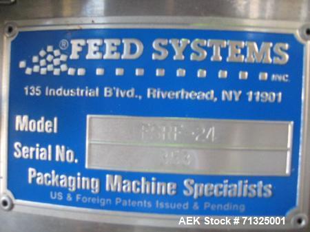 Used KapsAll, Model C-8, Automatic (8) Spindle Capper. Single belt container gripper. Manufacture stated cap size range 8mm-120mm (with proper change parts).