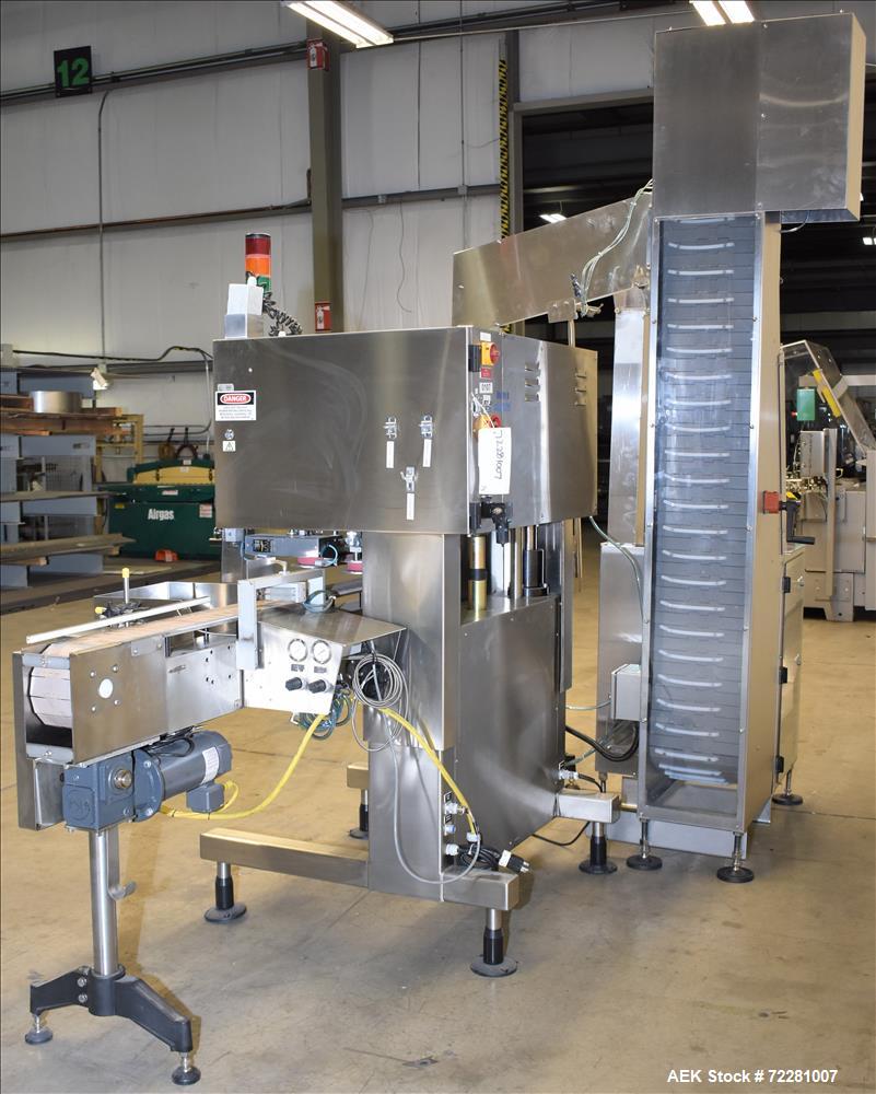 Used New Jersey Machine (NJM) Model Unicap-150 Automatic Inline Quill Capper.