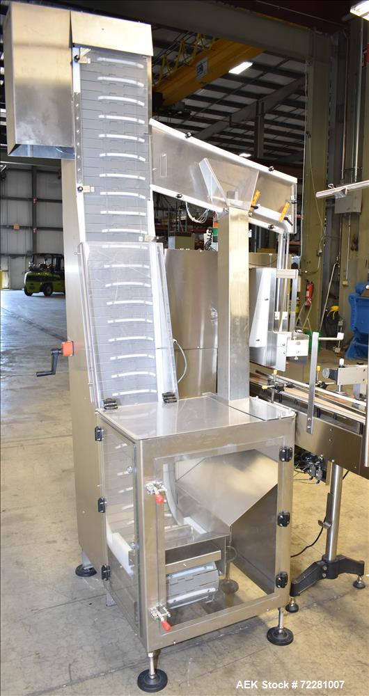 Used New Jersey Machine (NJM) Model Unicap-150 Automatic Inline Quill Capper.