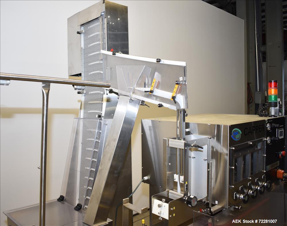 Used New Jersey Machine (NJM) Model Unicap-150 Automatic Inline Quill Capper.
