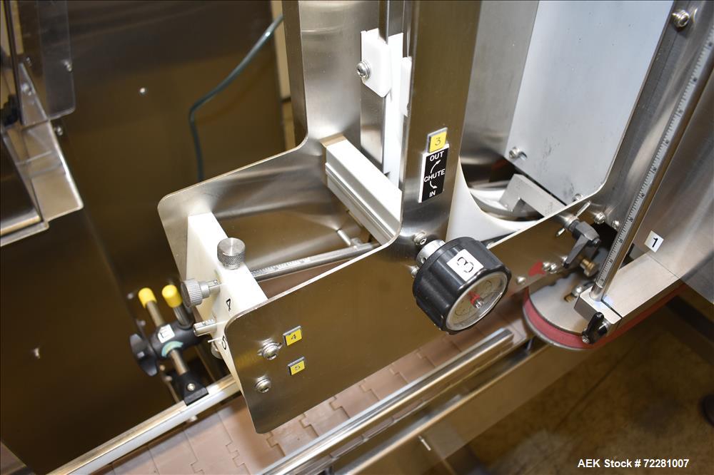Used New Jersey Machine (NJM) Model Unicap-150 Automatic Inline Quill Capper.