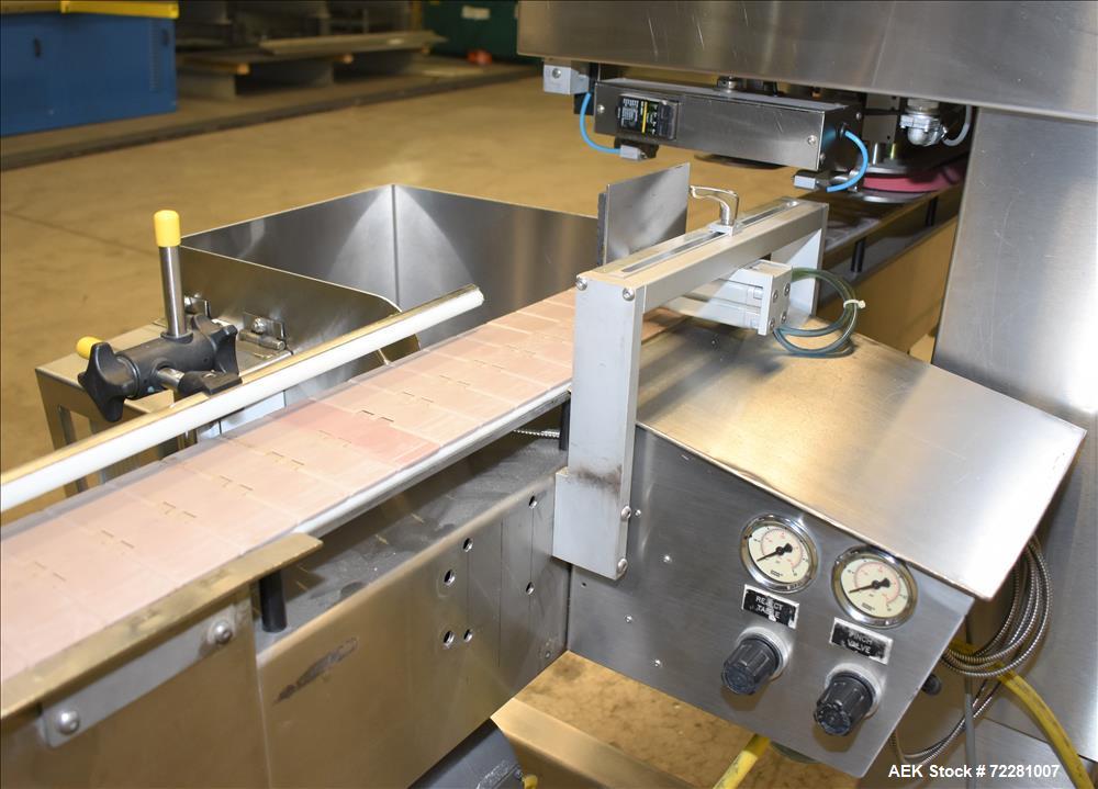 Used New Jersey Machine (NJM) Model Unicap-150 Automatic Inline Quill Capper.