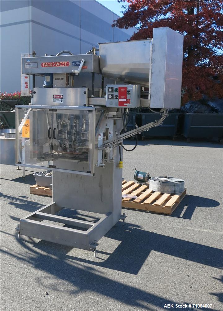 Used Pack West Model Auto 120 capper capable of speeds from 80 - 150 caps per minute. Cap size range: 10mm - 120mm with changeparts.  In-Line Cappe, 6 Quill capper, dual gripper belt, gripper speed c...