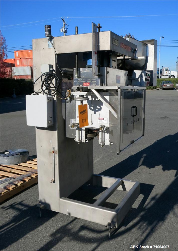Used Pack West Model Auto 120 capper capable of speeds from 80 - 150 caps per minute. Cap size range: 10mm - 120mm with changeparts.  In-Line Cappe, 6 Quill capper, dual gripper belt, gripper speed c...