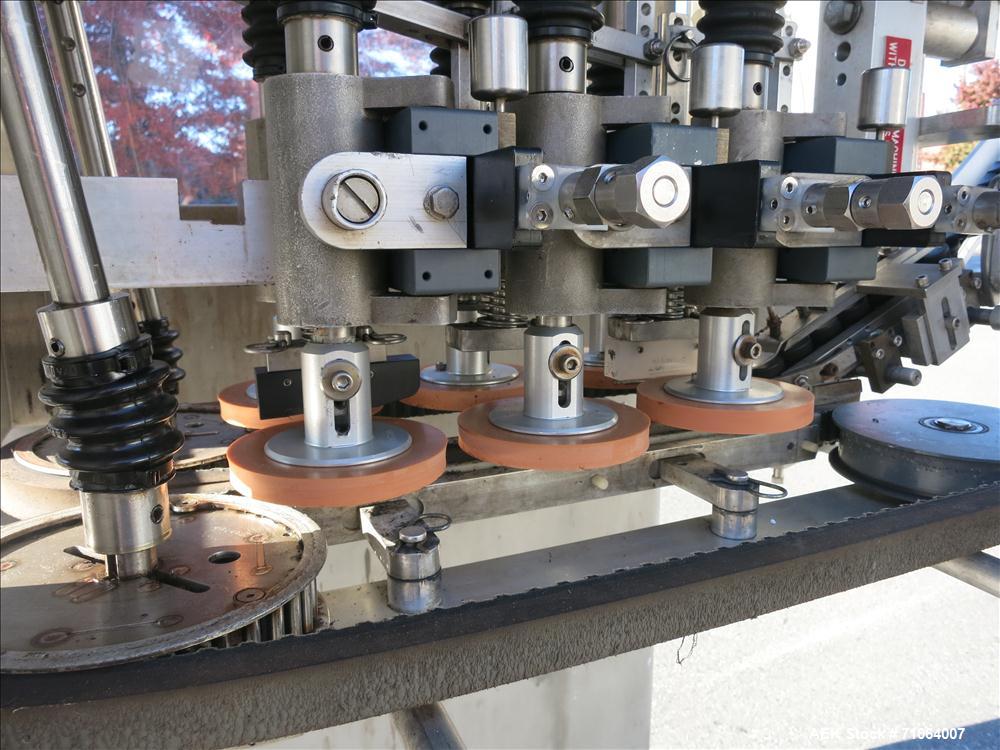 Used Pack West Model Auto 120 capper capable of speeds from 80 - 150 caps per minute. Cap size range: 10mm - 120mm with changeparts.  In-Line Cappe, 6 Quill capper, dual gripper belt, gripper speed c...