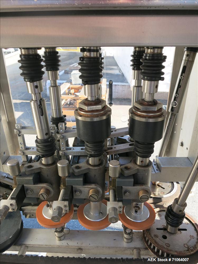 Used Pack West Model Auto 120 capper capable of speeds from 80 - 150 caps per minute. Cap size range: 10mm - 120mm with changeparts.  In-Line Cappe, 6 Quill capper, dual gripper belt, gripper speed c...