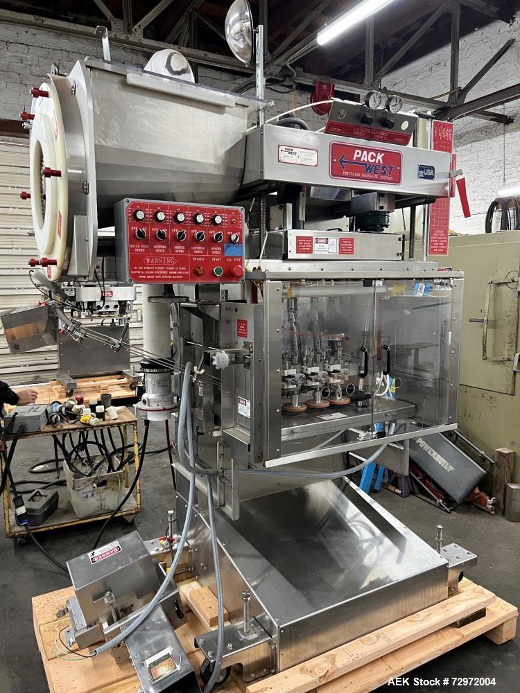Used Pack West Model Auto 120Left to Right Automatic Inline Spindle Capper. Six (6) quill tighteners. Machine is capable of speeds from 80 to 150 caps per minute. Has a cap size range of 10mm to 120m...