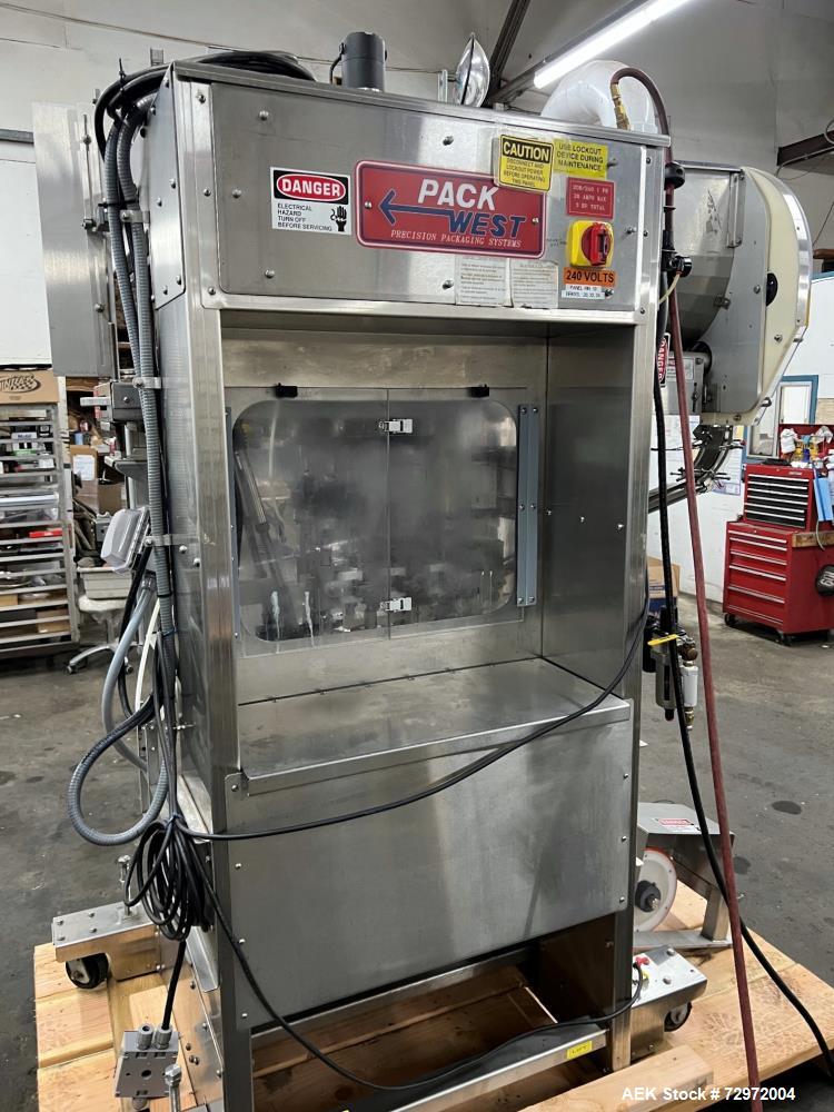 Used Pack West Model Auto 120Left to Right Automatic Inline Spindle Capper. Six (6) quill tighteners. Machine is capable of speeds from 80 to 150 caps per minute. Has a cap size range of 10mm to 120m...