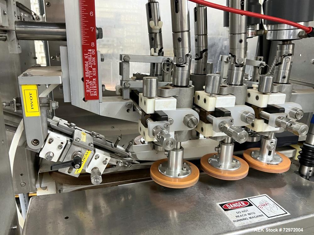 Used Pack West Model Auto 120Left to Right Automatic Inline Spindle Capper. Six (6) quill tighteners. Machine is capable of speeds from 80 to 150 caps per minute. Has a cap size range of 10mm to 120m...