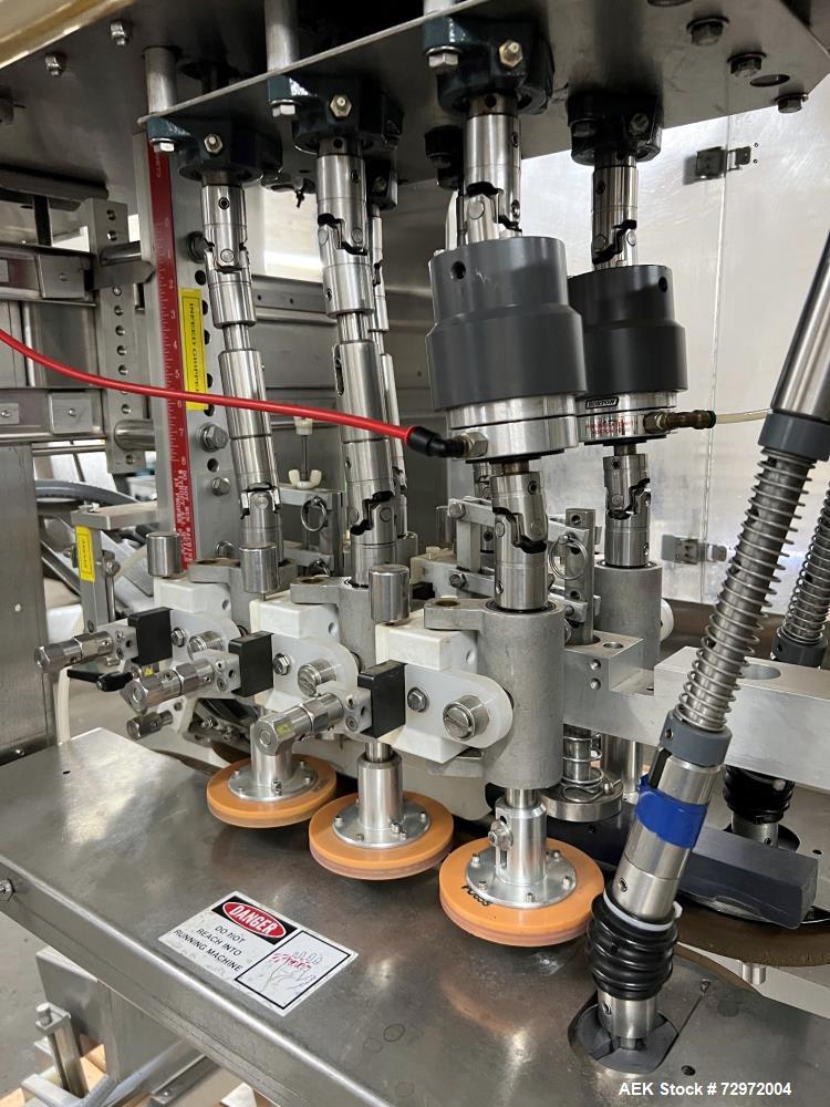 Used Pack West Model Auto 120Left to Right Automatic Inline Spindle Capper. Six (6) quill tighteners. Machine is capable of speeds from 80 to 150 caps per minute. Has a cap size range of 10mm to 120m...