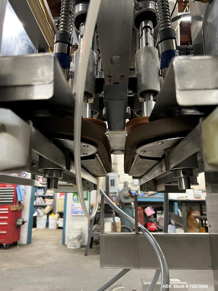 Used Pack West Model Auto 120Left to Right Automatic Inline Spindle Capper. Six (6) quill tighteners. Machine is capable of speeds from 80 to 150 caps per minute. Has a cap size range of 10mm to 120m...