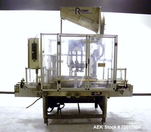 Used Resina In-Line Quill Style Capper, Model NRU-301417. (3) Sets of 2 quills, rates up to approximately 300 caps per minute. Adjustable from 10-70mm caps depending on change parts. Includes a pin s...