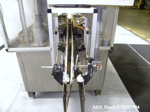 Used Resina In-Line Quill Style Capper, Model NRU-301417. (3) Sets of 2 quills, rates up to approximately 300 caps per minute. Adjustable from 10-70mm caps depending on change parts. Includes a pin s...