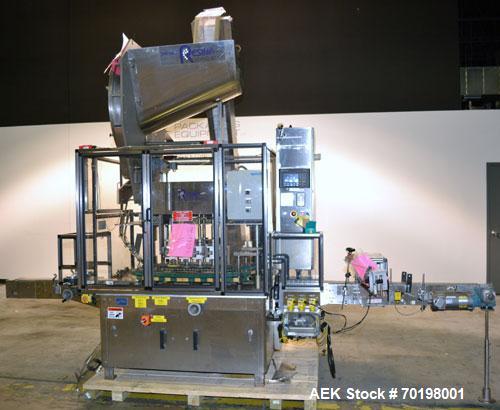 Used Resina Model NRU51 High Speed Automatic Inline Quill Capper. Machine is capable of speeds up to 300 bpm. Cap size range: 10mm to 89mm with changeparts. Equipped with dual belt gripper, H26 exten...