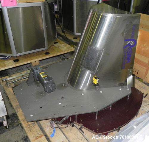 Used Resina Model NRU51 High Speed Automatic Inline Quill Capper. Machine is capable of speeds up to 300 bpm. Cap size range: 10mm to 89mm with changeparts. Equipped with dual belt gripper, H26 exten...