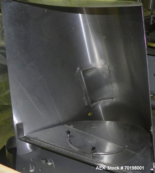 Used Resina Model NRU51 High Speed Automatic Inline Quill Capper. Machine is capable of speeds up to 300 bpm. Cap size range: 10mm to 89mm with changeparts. Equipped with dual belt gripper, H26 exten...