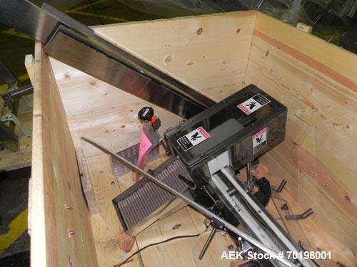 Used Resina Model NRU51 High Speed Automatic Inline Quill Capper. Machine is capable of speeds up to 300 bpm. Cap size range: 10mm to 89mm with changeparts. Equipped with dual belt gripper, H26 exten...
