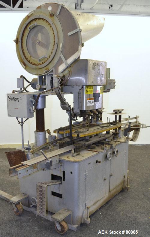 Used Resina Model U-30 Inline Quill Style Capper. Manufacturer rates at up to approximately 250 caps per minute on 13 mm to 38 mm or 43 mm to 70 mm cap size ranges, depending on change parts. This mo...