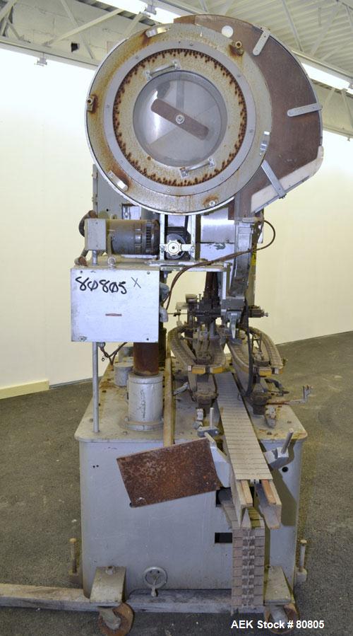 Used Resina Model U-30 Inline Quill Style Capper. Manufacturer rates at up to approximately 250 caps per minute on 13 mm to 38 mm or 43 mm to 70 mm cap size ranges, depending on change parts. This mo...