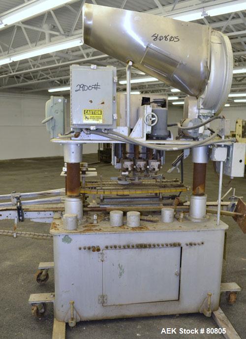 Used Resina Model U-30 Inline Quill Style Capper. Manufacturer rates at up to approximately 250 caps per minute on 13 mm to 38 mm or 43 mm to 70 mm cap size ranges, depending on change parts. This mo...